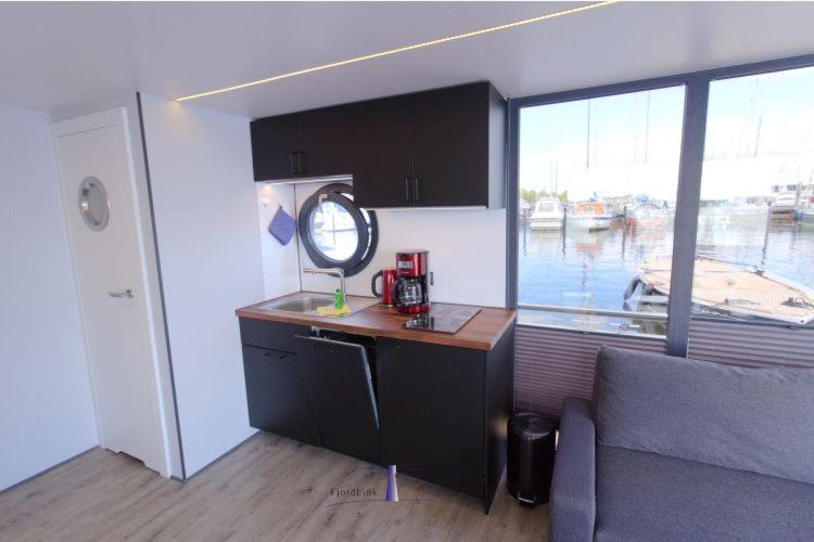 Hausboot Fjord Aries Mit Dachterrasse In Schleswig Hotel Eksteriør billede